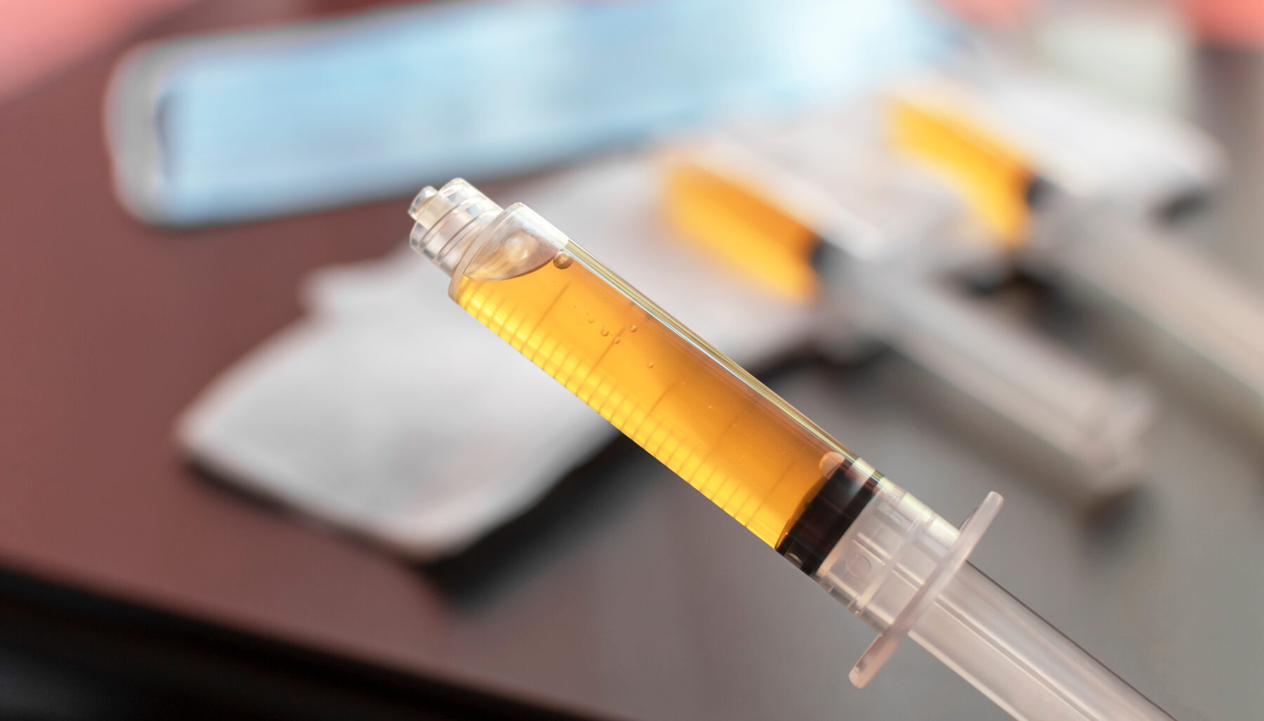 Clinical supplies arranged on a light surface in a treatment room at Pulse Health & Wellness